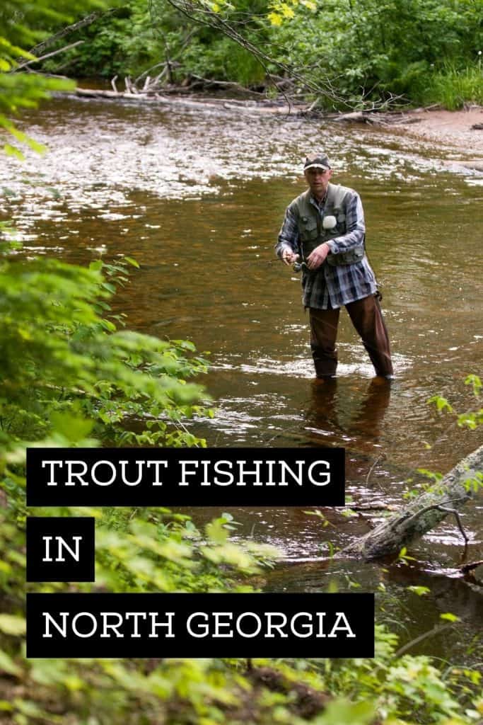 man trout fishing in north georgia in a stream